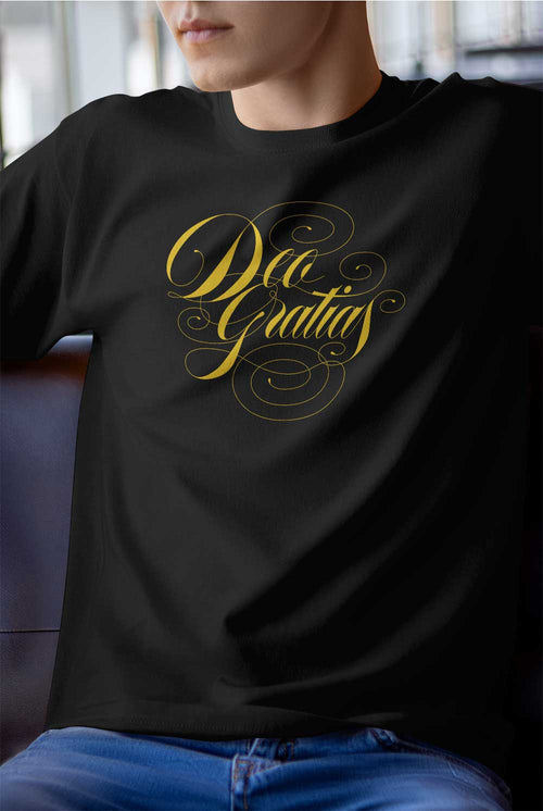 Deo Gratias tshirt pose on chair